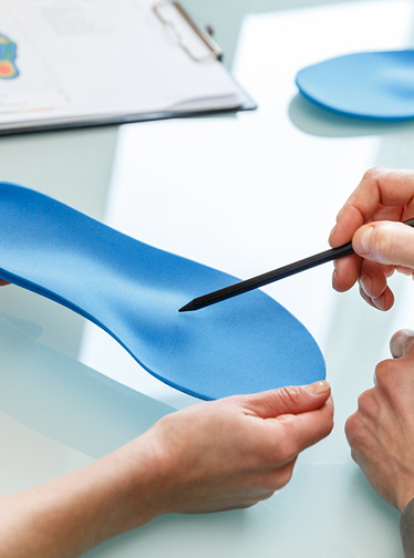 Custom orthotics being fitted
